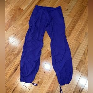 Lululemon purple joggers with tightening waistband and tightens on ankles size 8